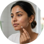 Dip the cotton swab into the powder layer only. Dab directly onto the pimple.
